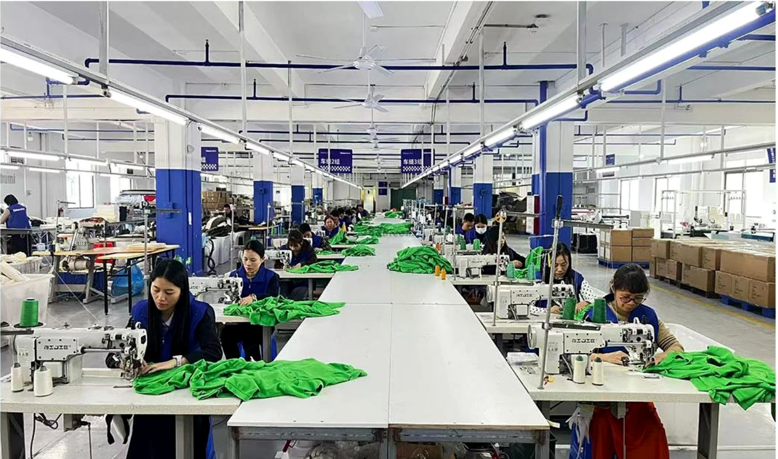 Garment sewing line and factory floor used for apparel production review