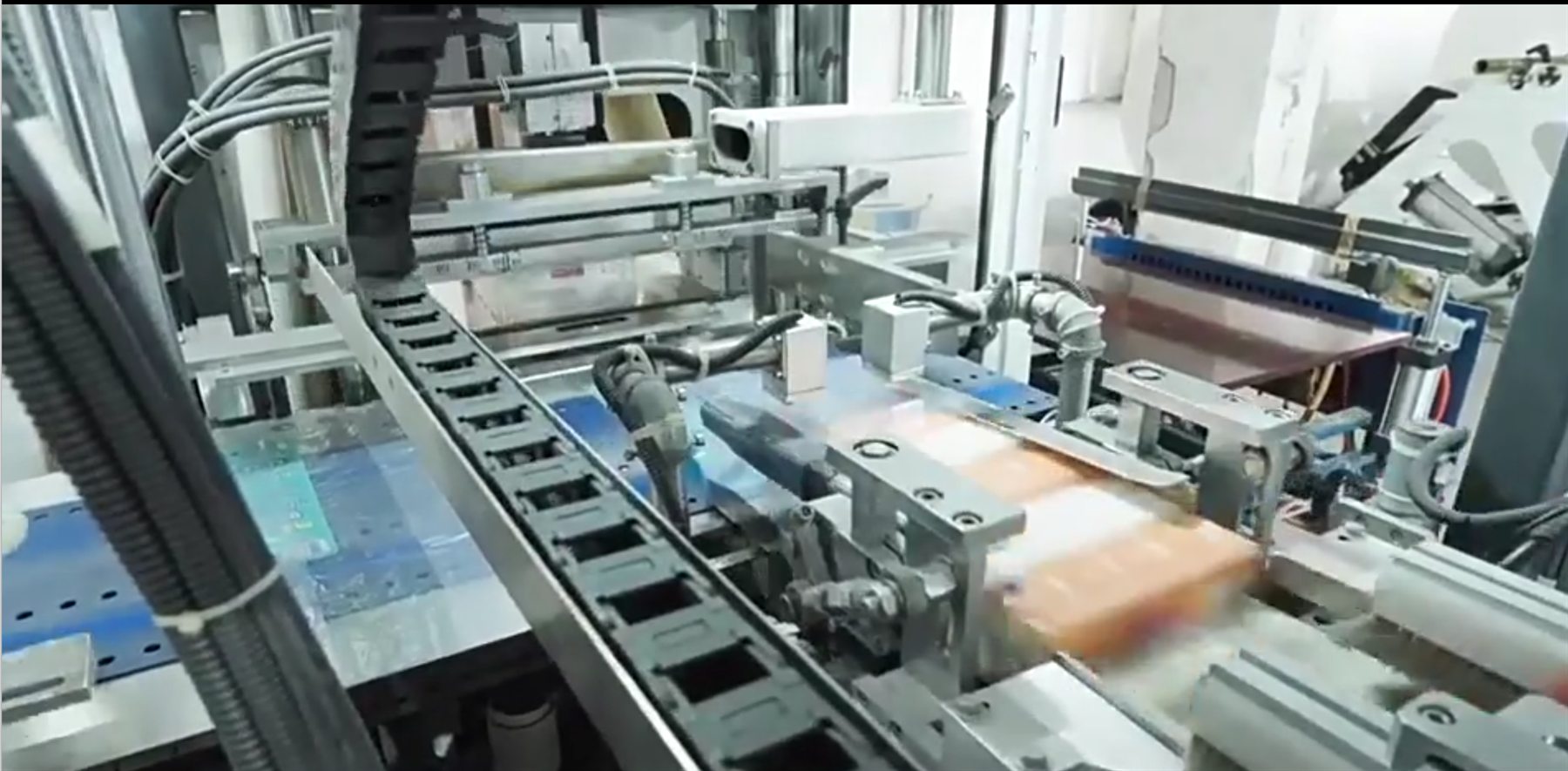 Automated tissue production equipment running inside a factory