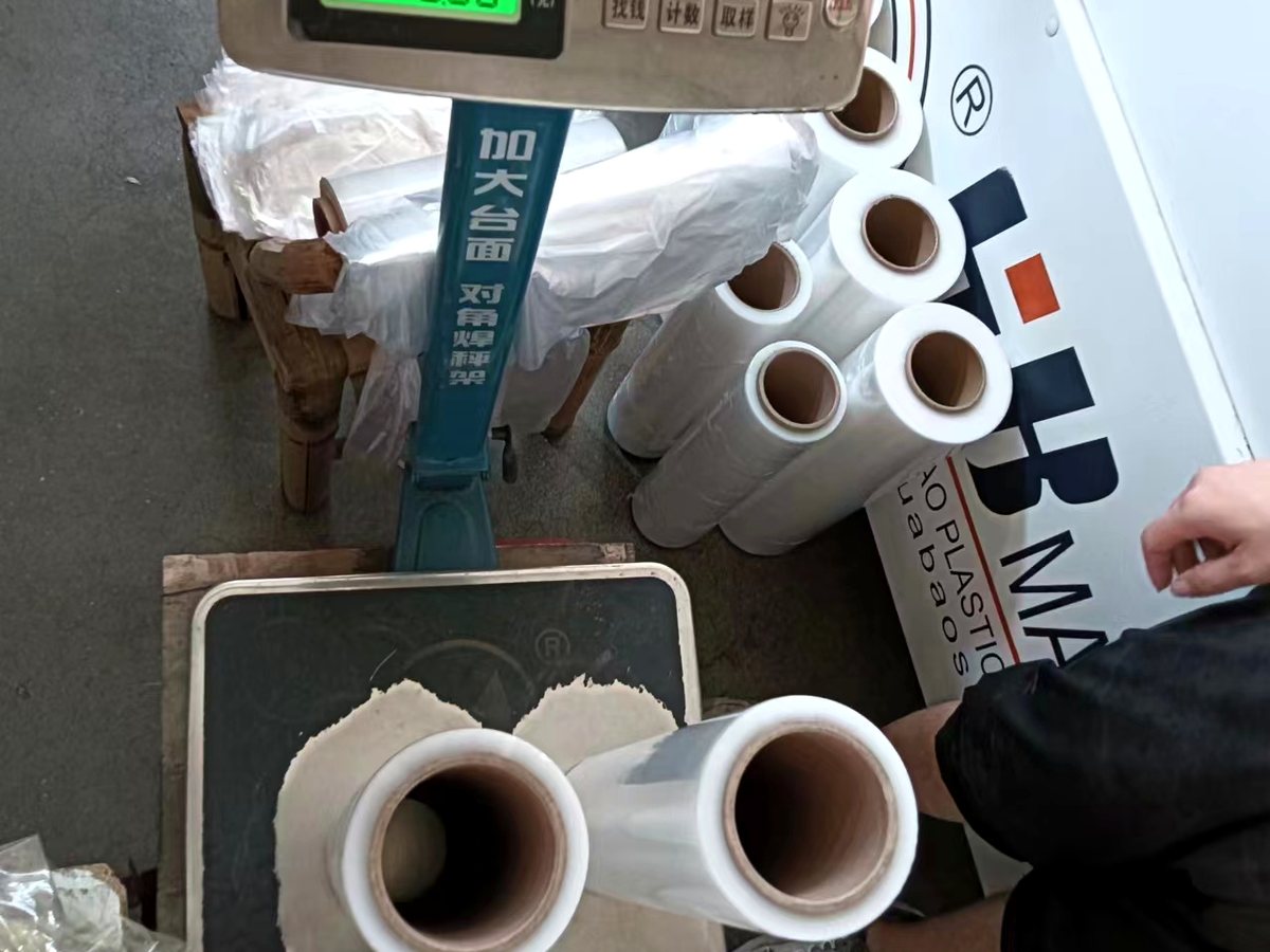 Weight check for roll goods during quality control
